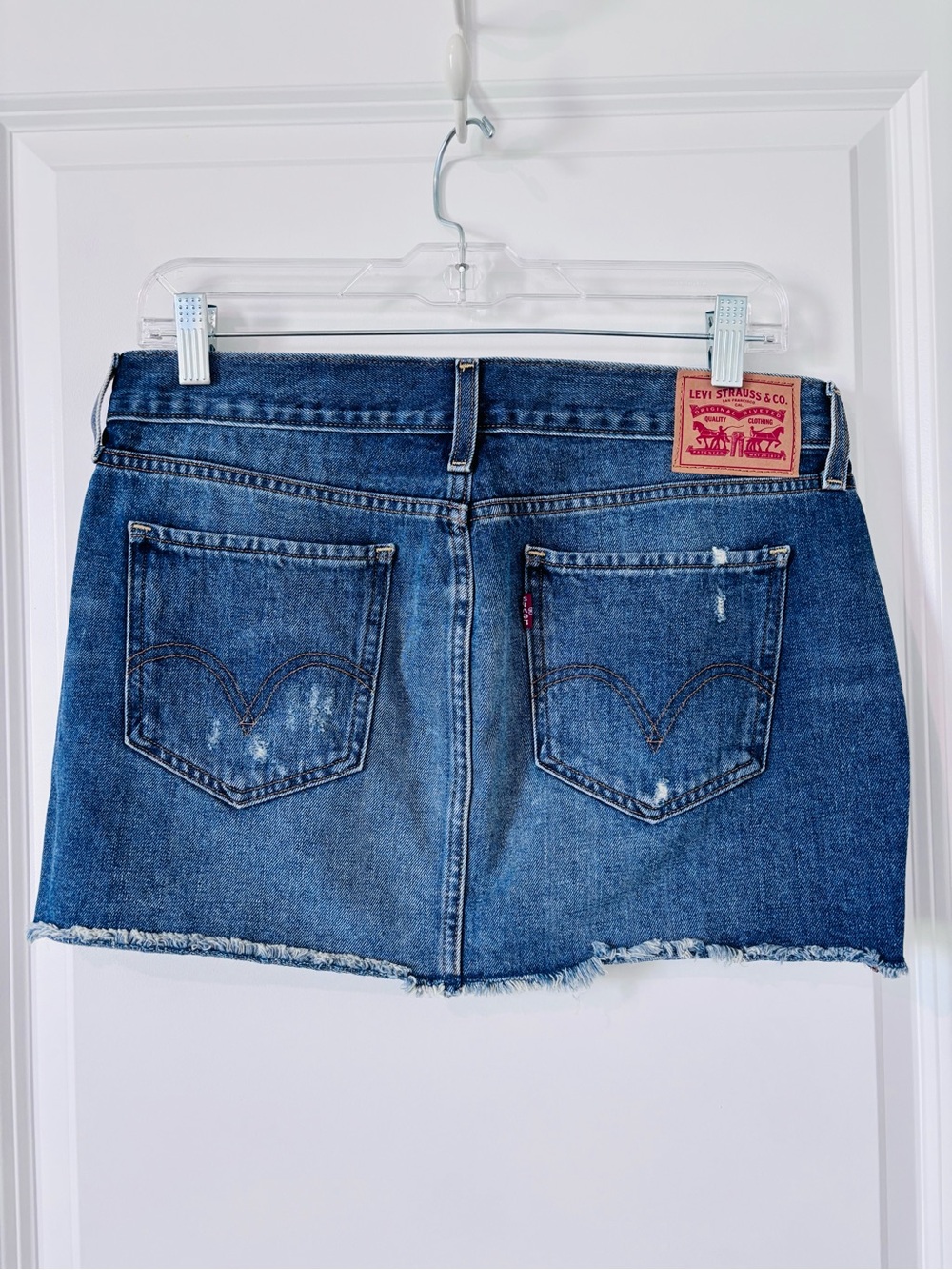 Levi's Blue Distressed Denim Mini Skirt with Frayed Hem